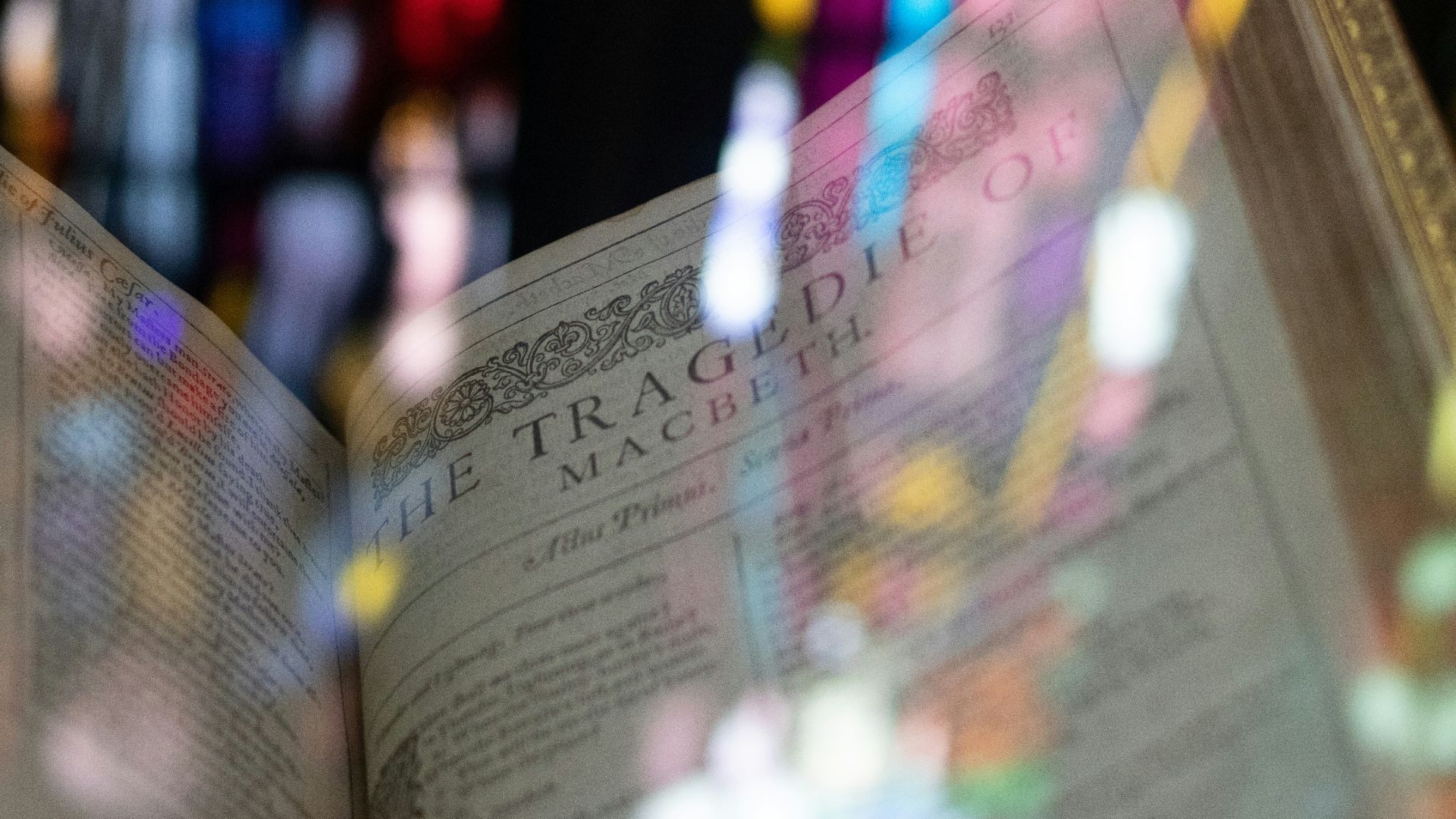 a close up of an open book on a table