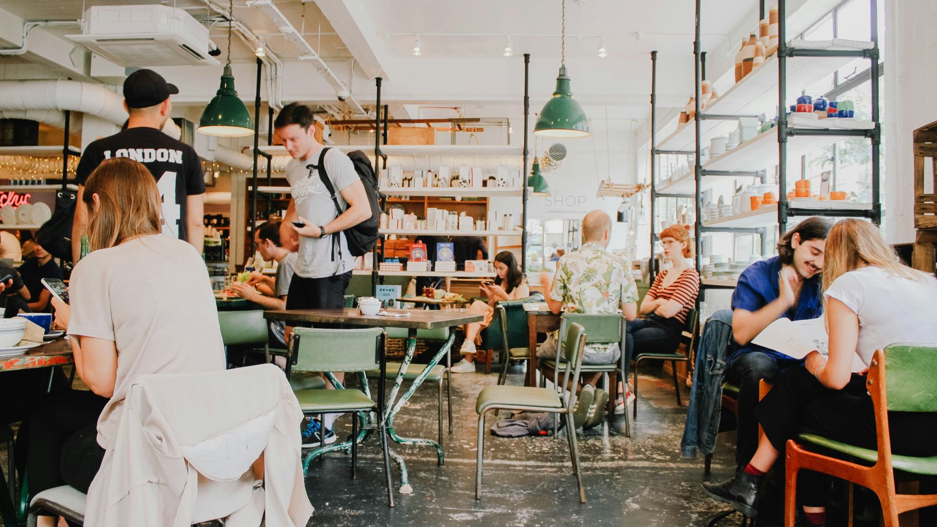 people eating inside of cafeteria during daytime