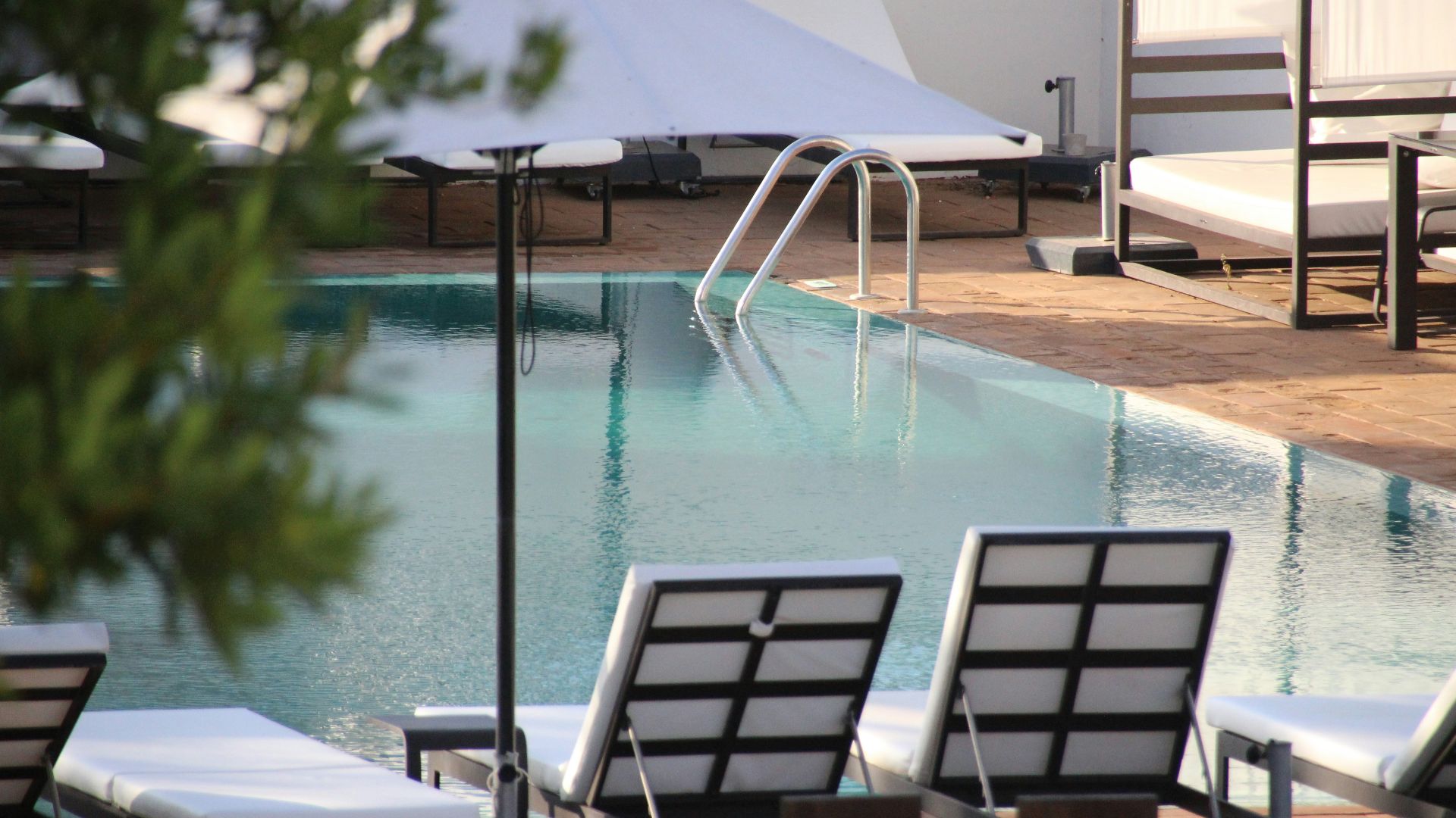 three white deck chairs