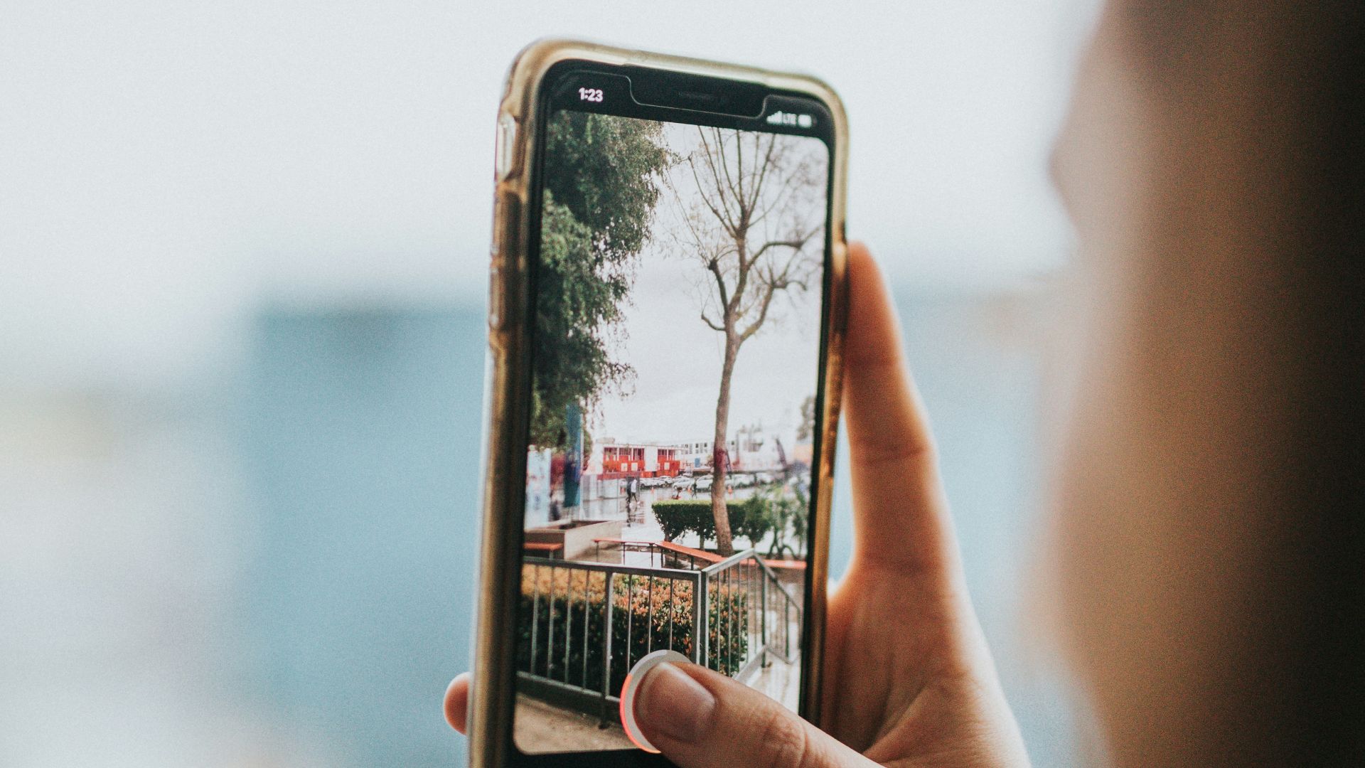 person holding silver iphone 6