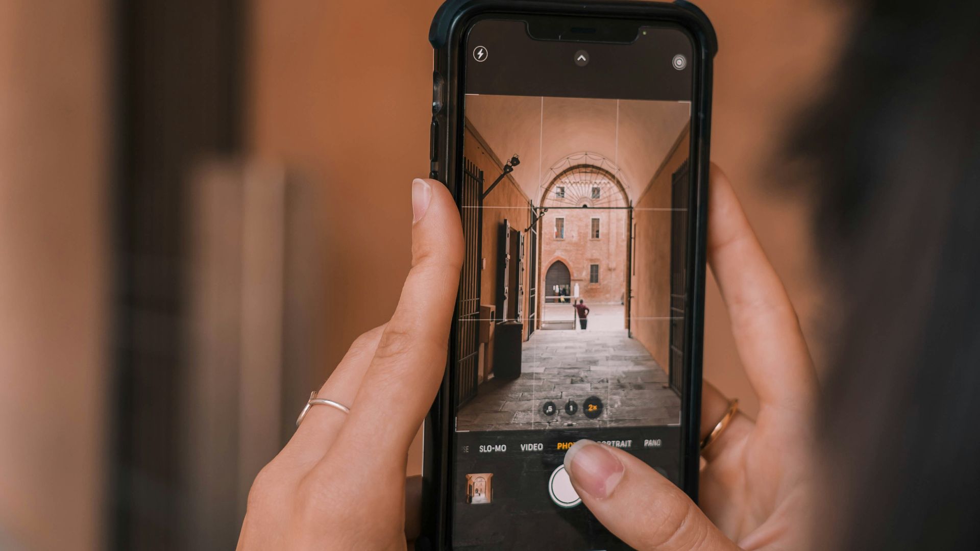 person holding black iphone 5