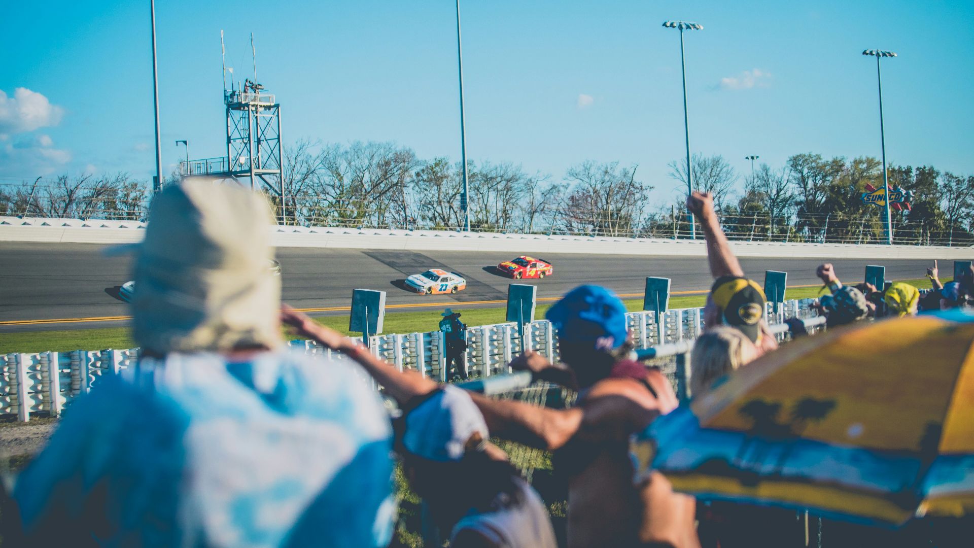 people watching car race