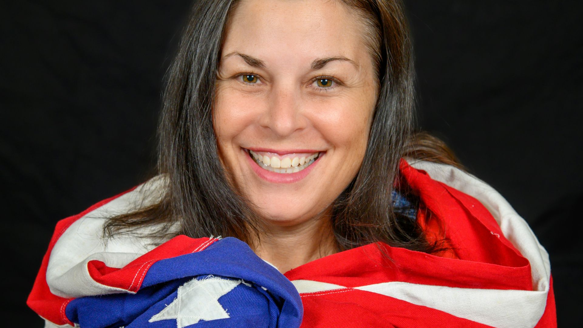 a person holding a flag