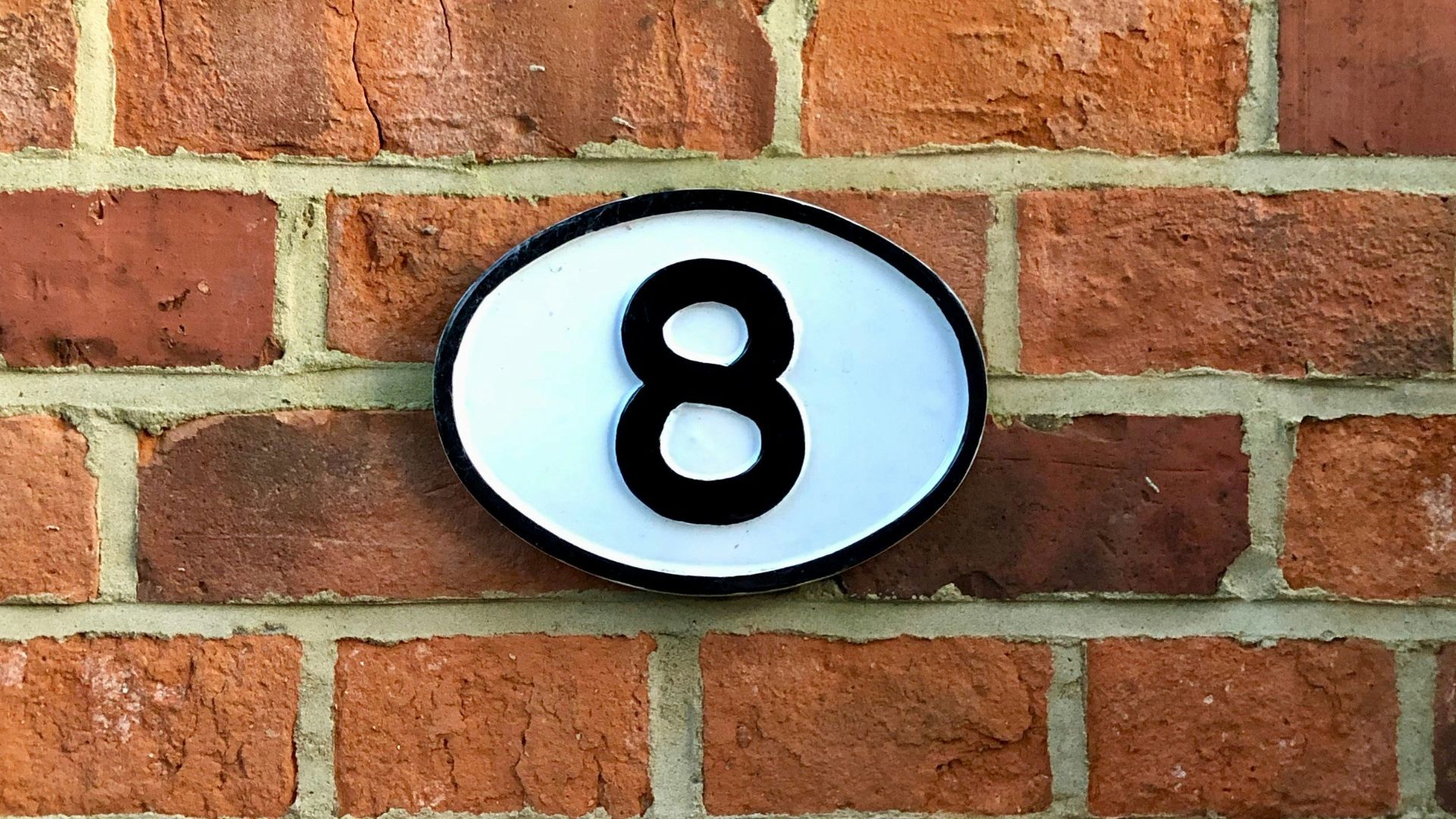 white and black 8 sign