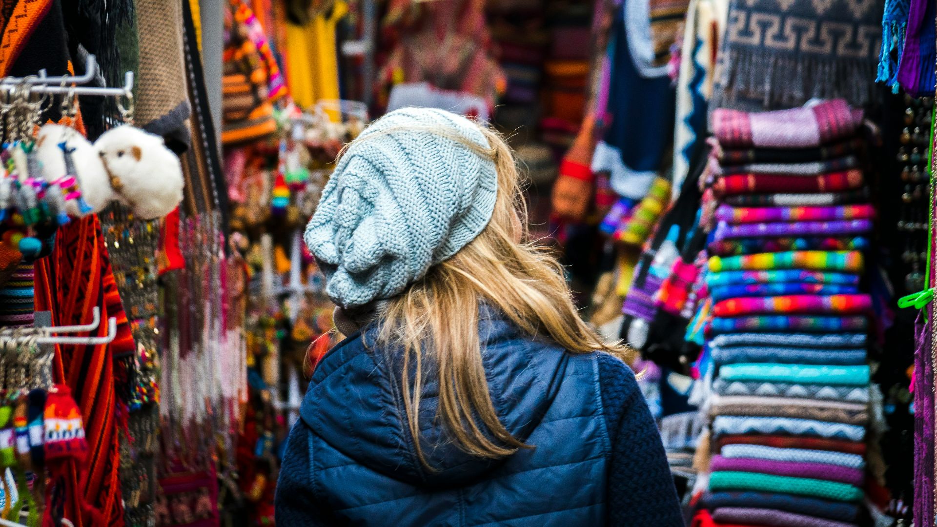 woman standing on clothes market