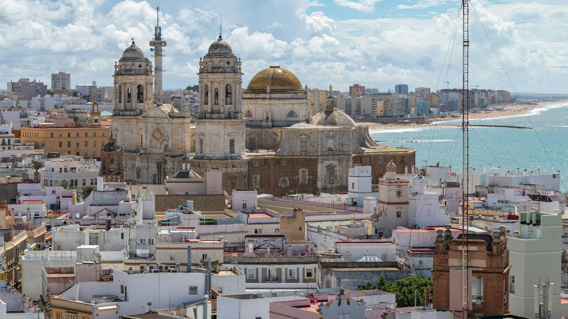 a view of a city with a large body of water in the background