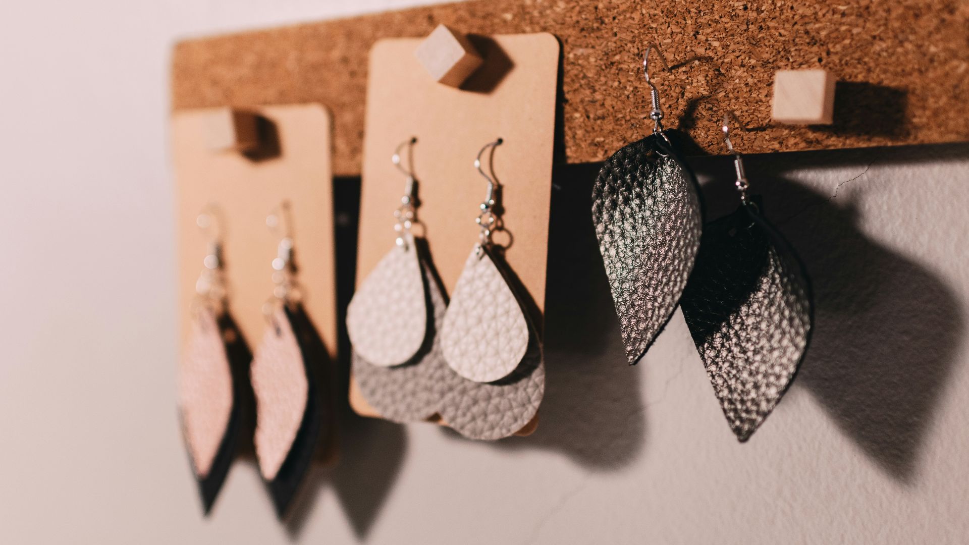 three pairs of silver hook earrings