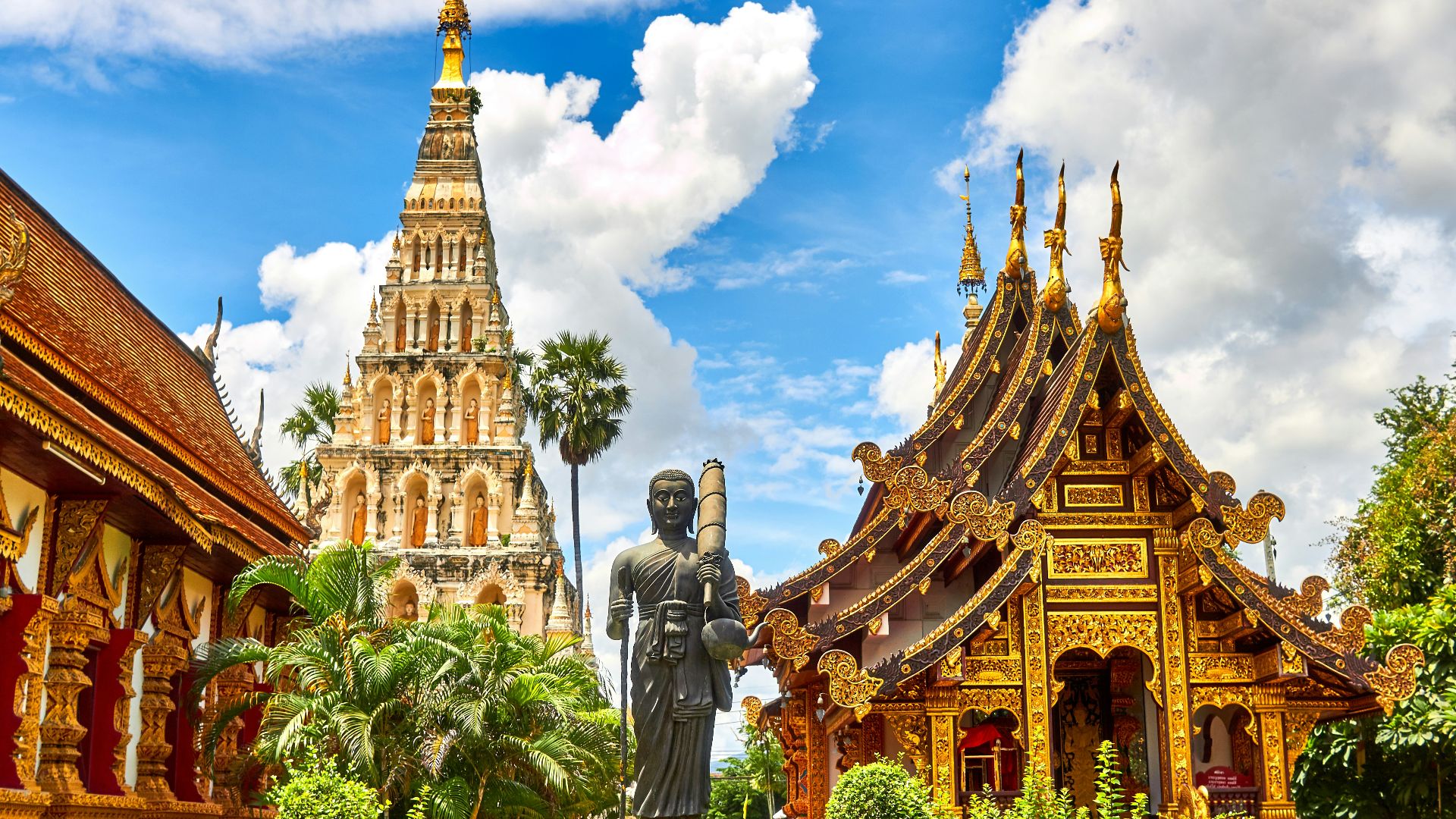 standing statue and temples landmark during daytime