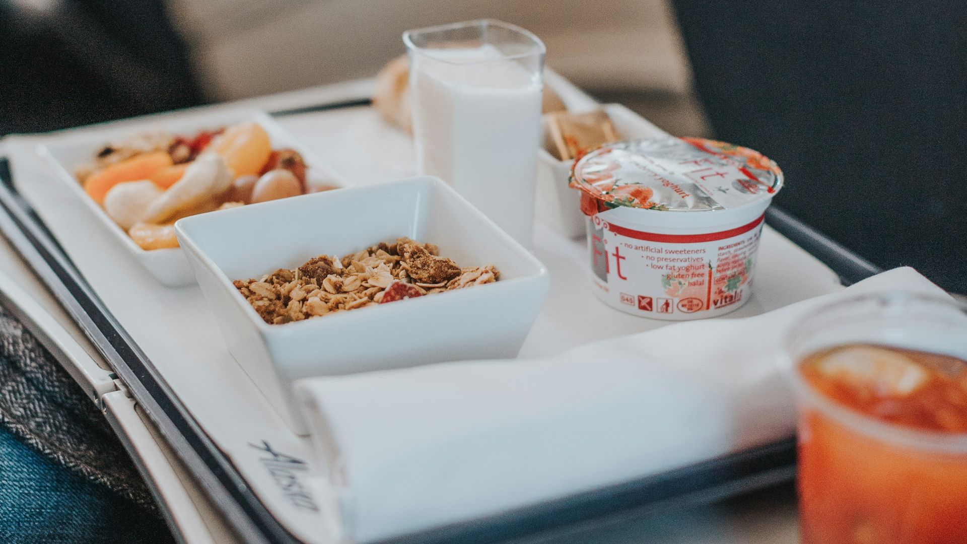 red liquid on cup beside bowl