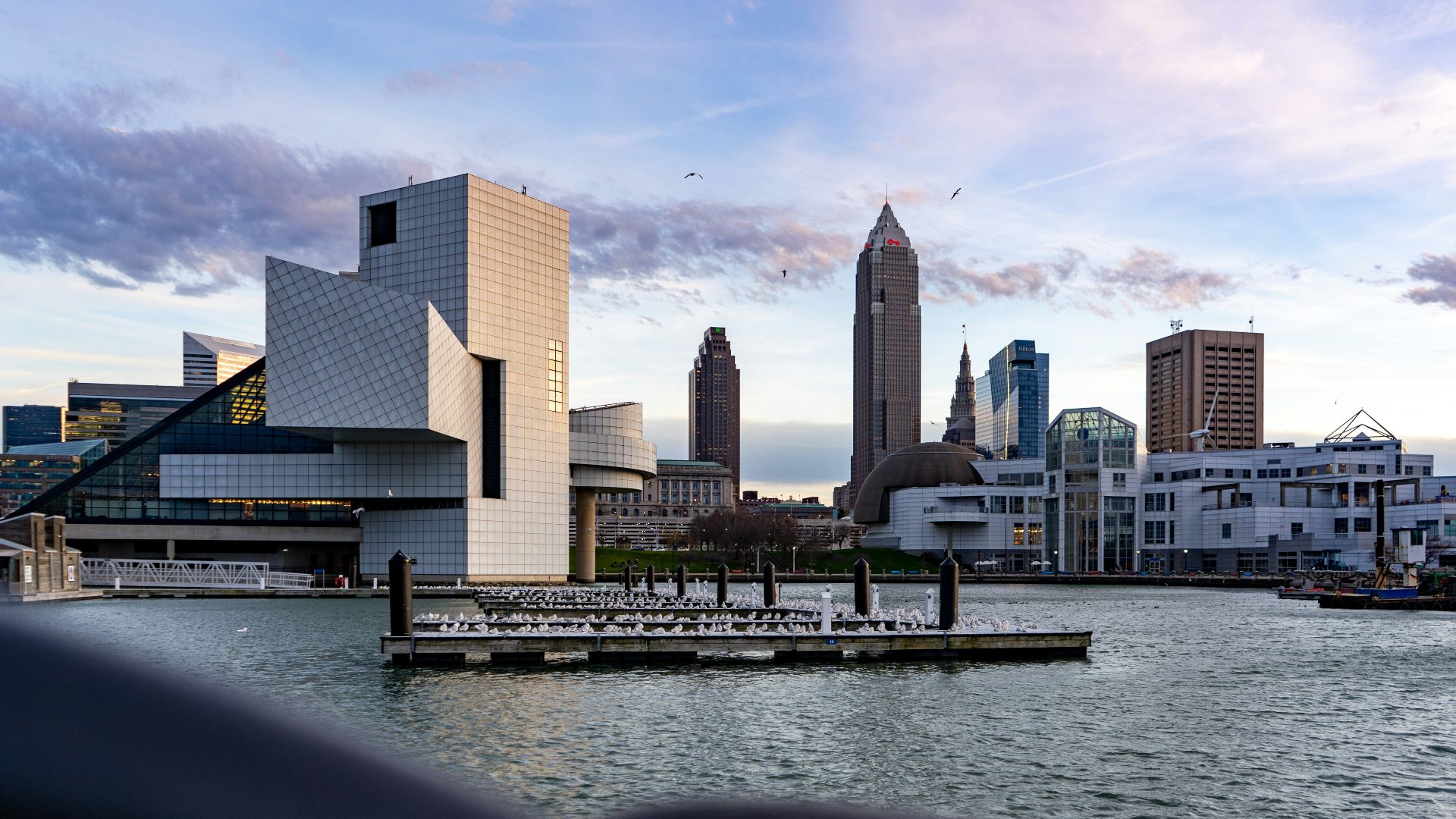city skyline across body of water during daytime