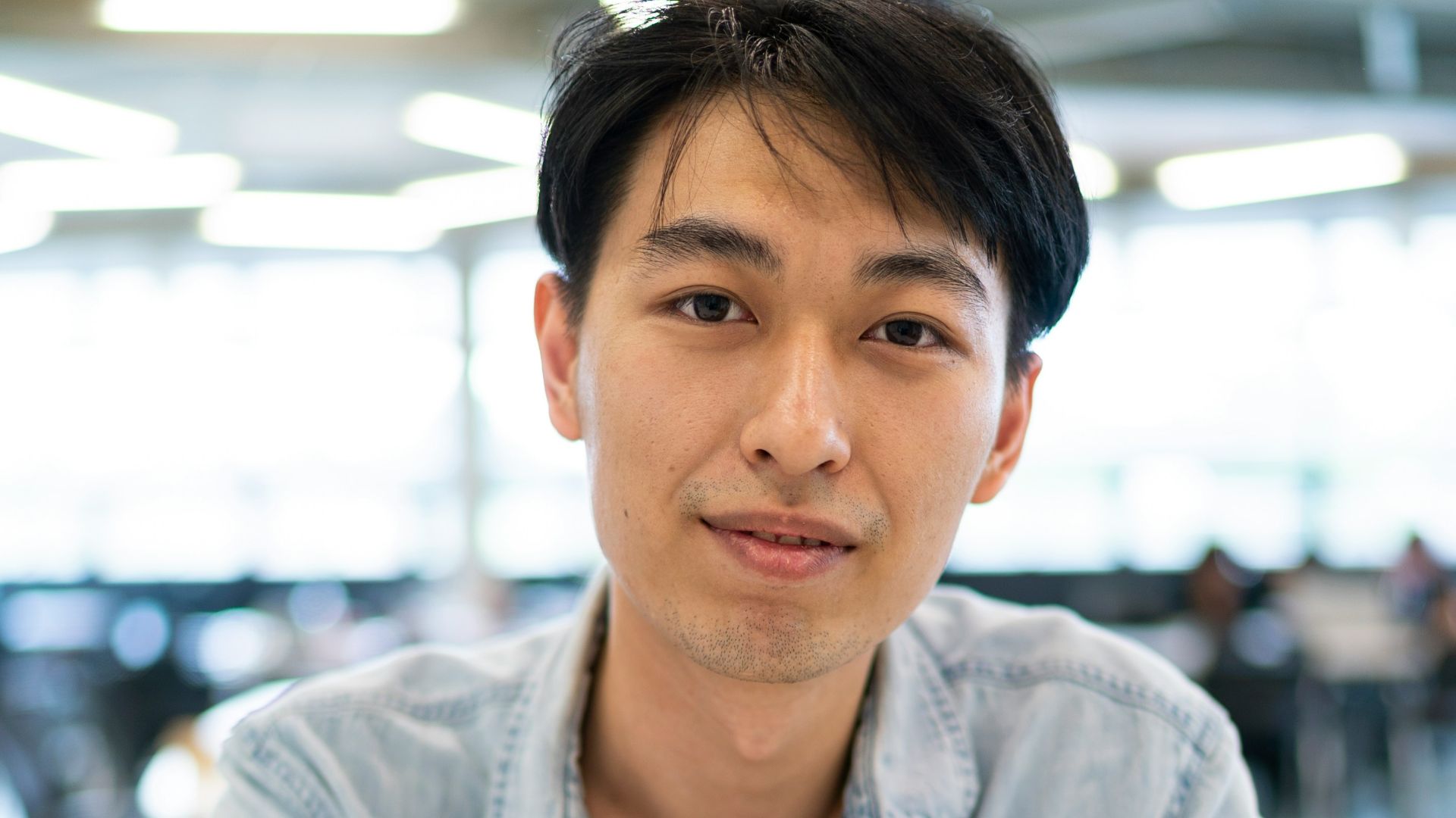 woman wearing blue dress shirt