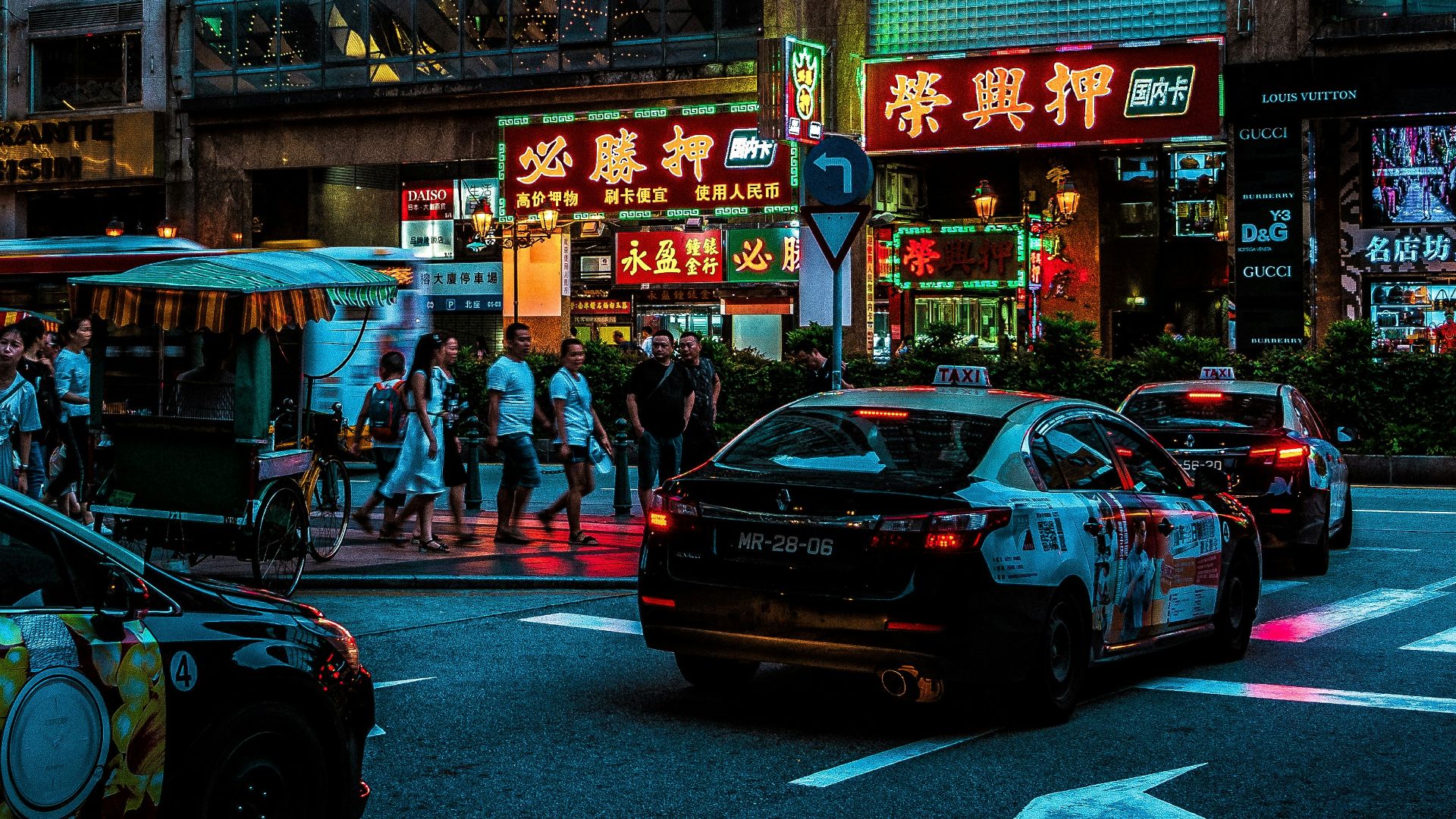 vehicle passing on Kanji signed building
