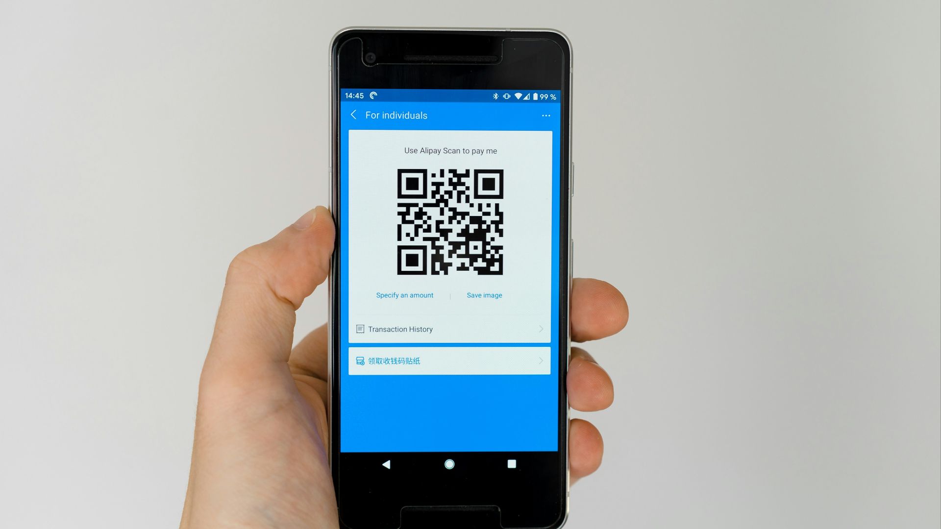 black android smartphone displaying qr code