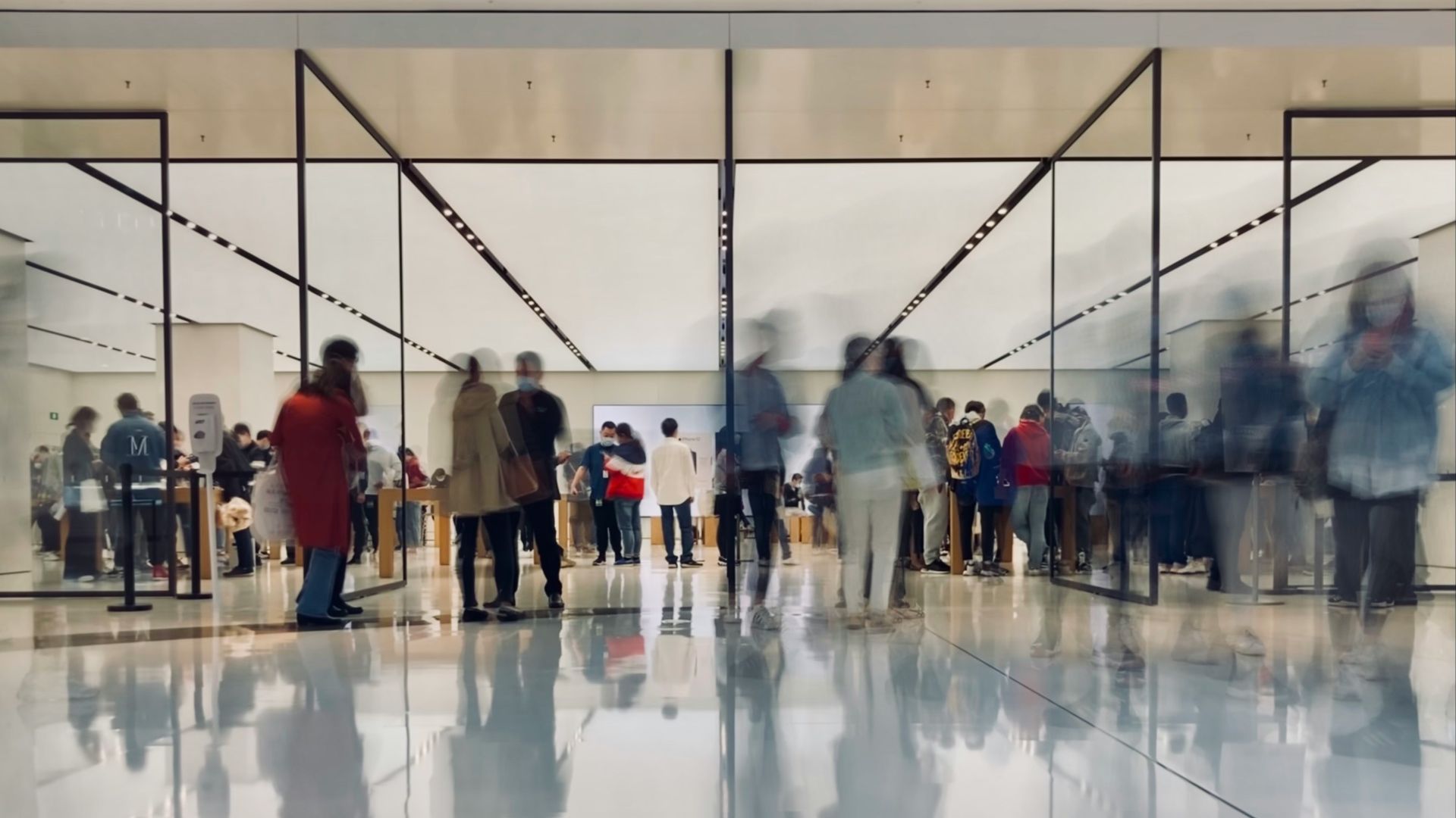 people walking on white floor tiles