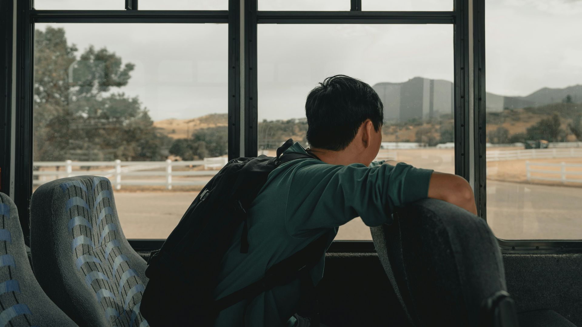 man sitting inside vehicle