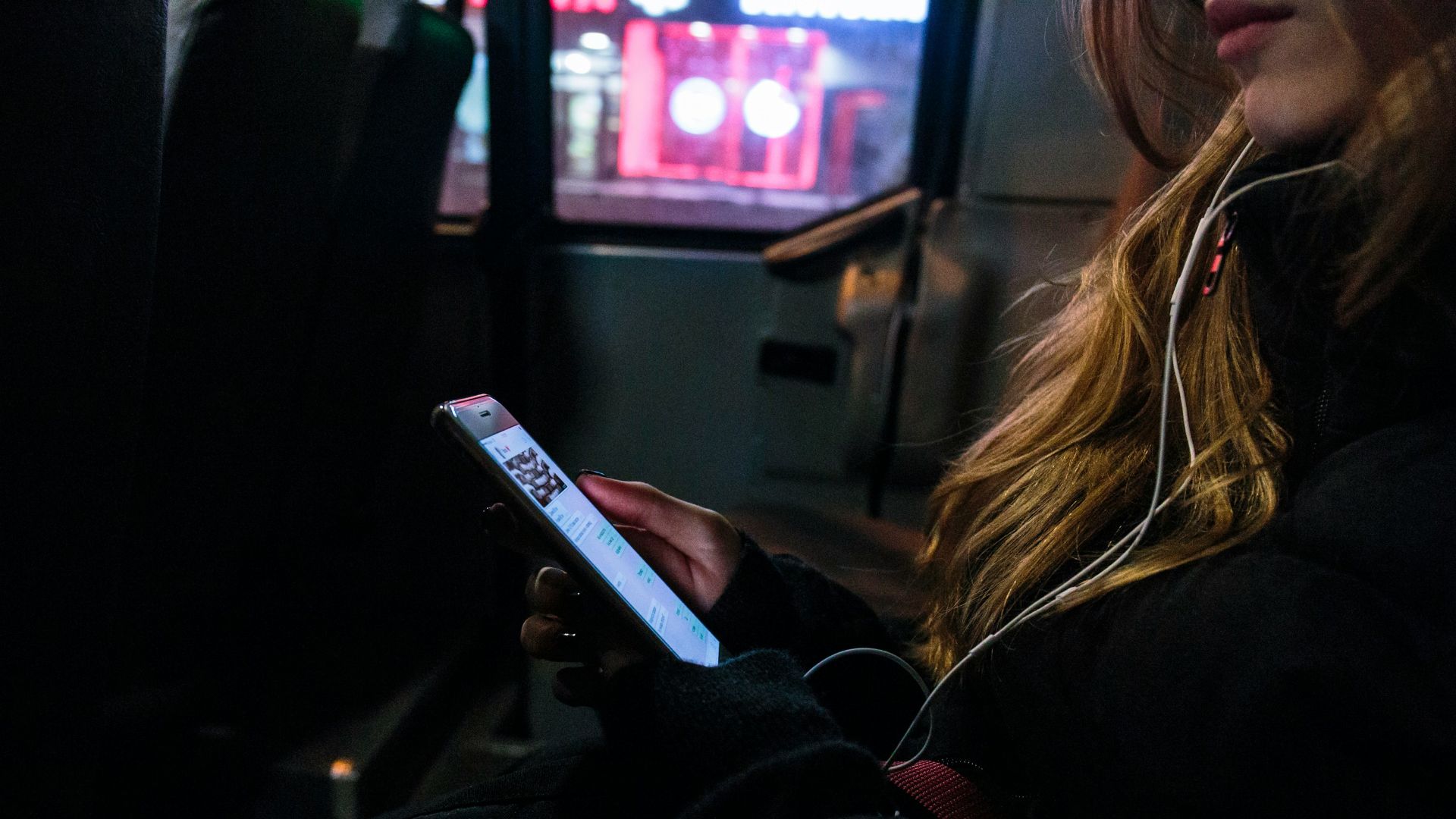 person uses smartphone