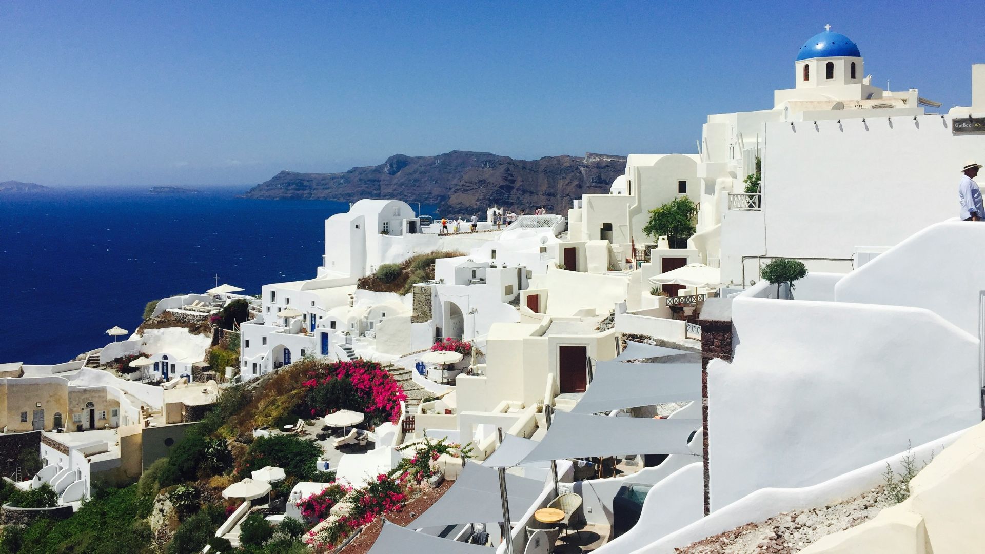 white concrete buildings under blue sky