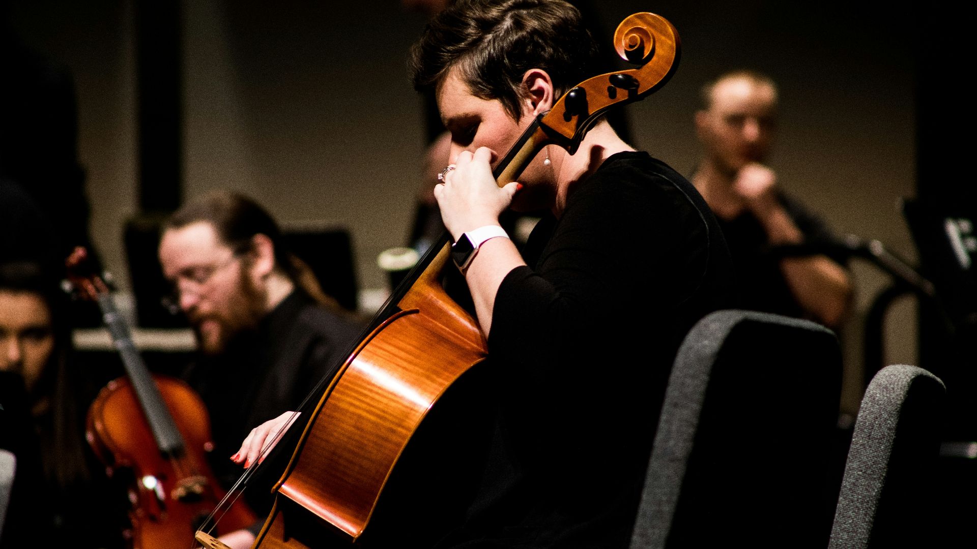 person playing stringed instrument