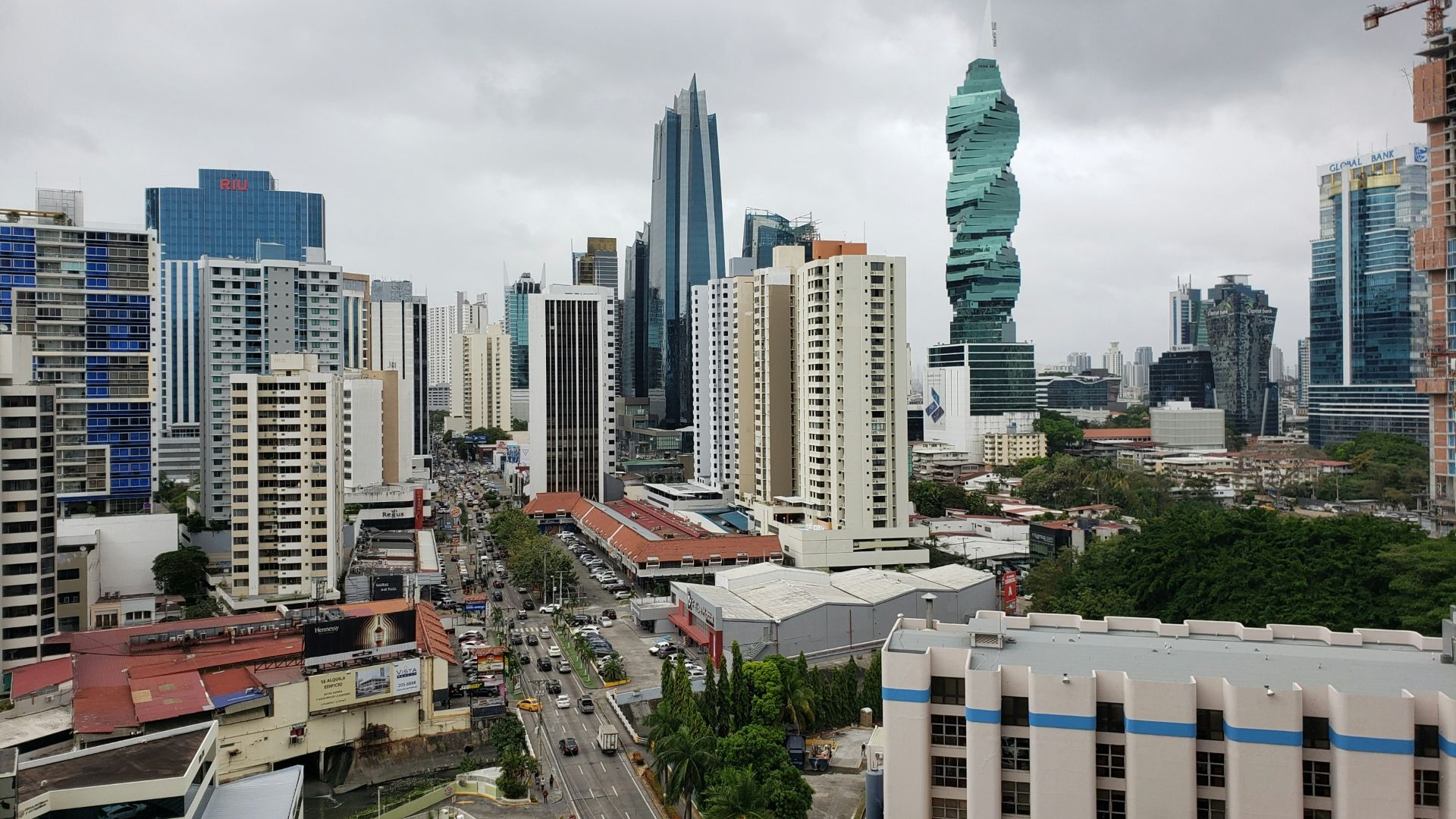 high rise buildings under white sky during daytime