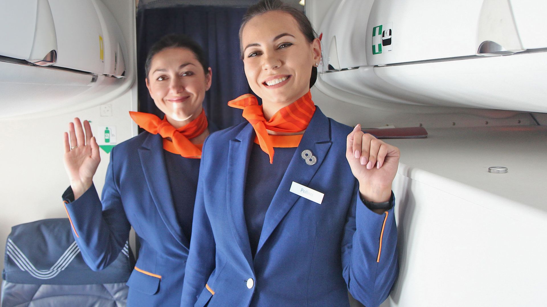 File:Flight attendant Aurora Airlines.jpg