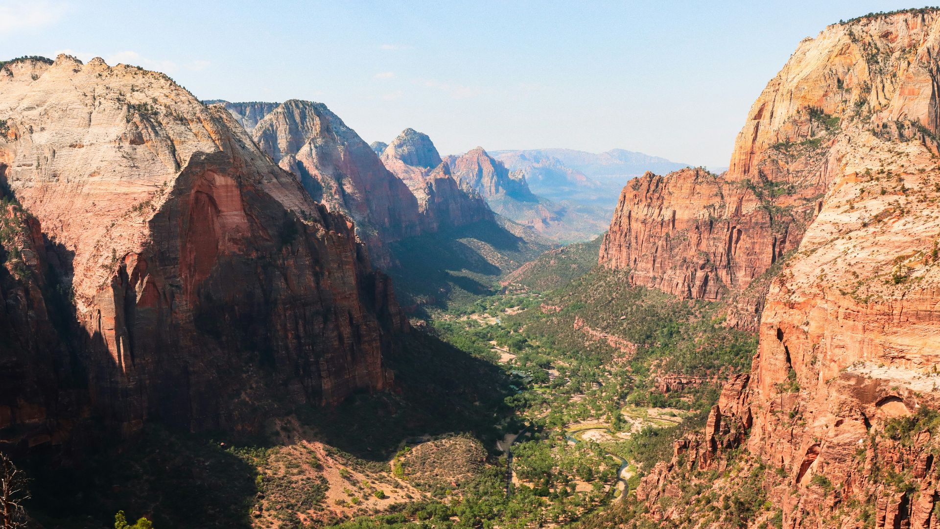 brown and green mountains under blue sky during daytime