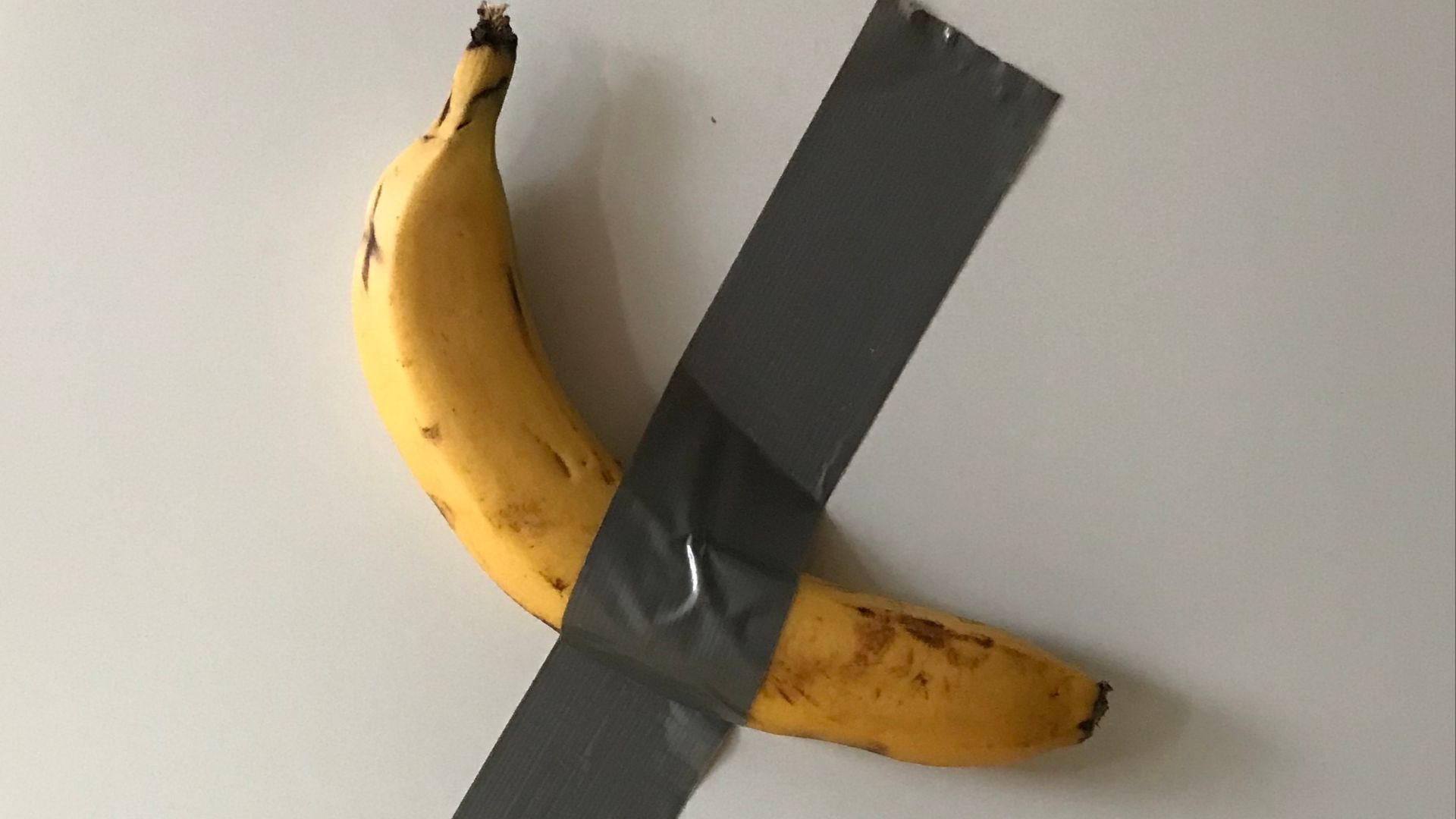 File:Banana duct taped to fridge as a reminder to eat less meat.jpg