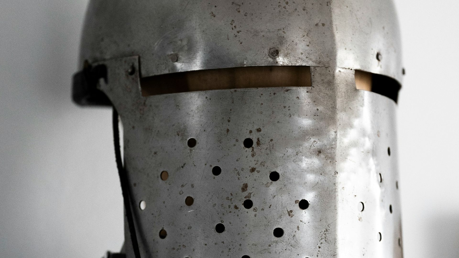 a close up of a knight's helmet and armor