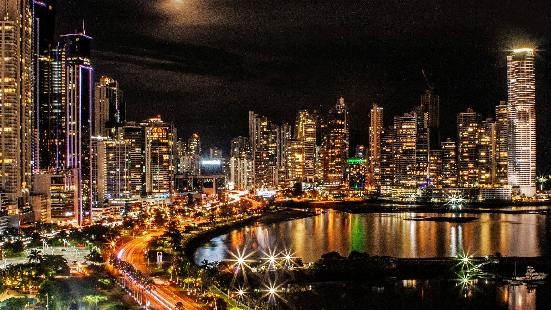city lights and buildings during nighttime