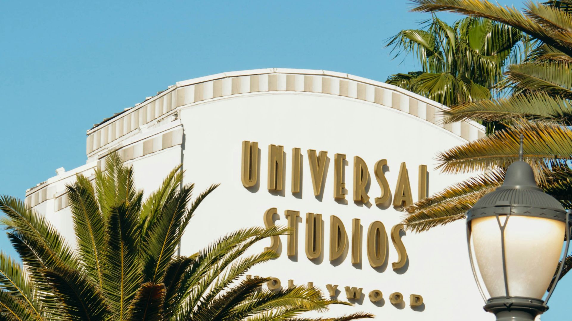 a large white building with a sign on it