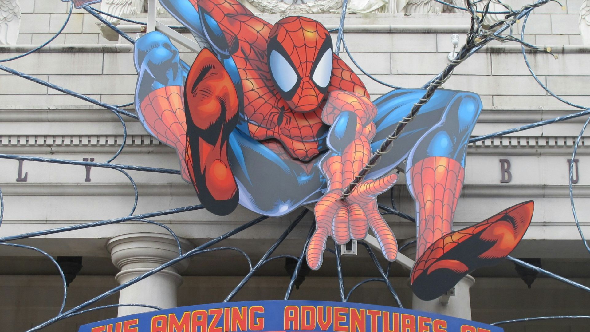 a sign for the amazing adventures of spider - man