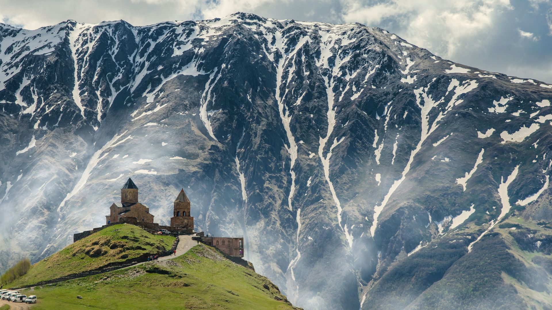 gray concrete building on hill