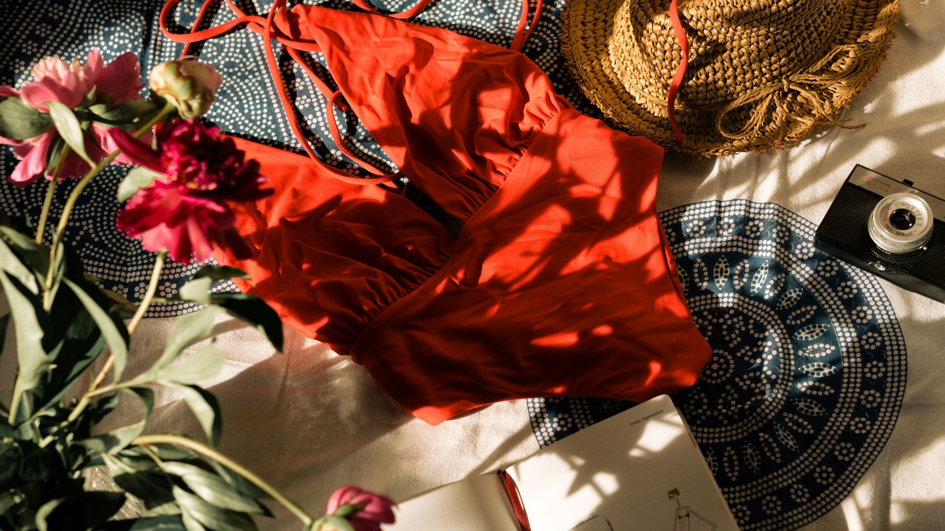 red textile on black and white textile