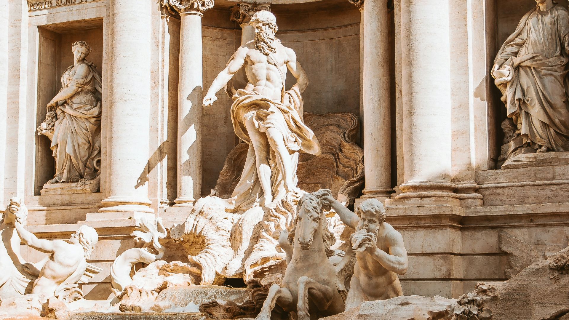 people and horses statue monument at daytime