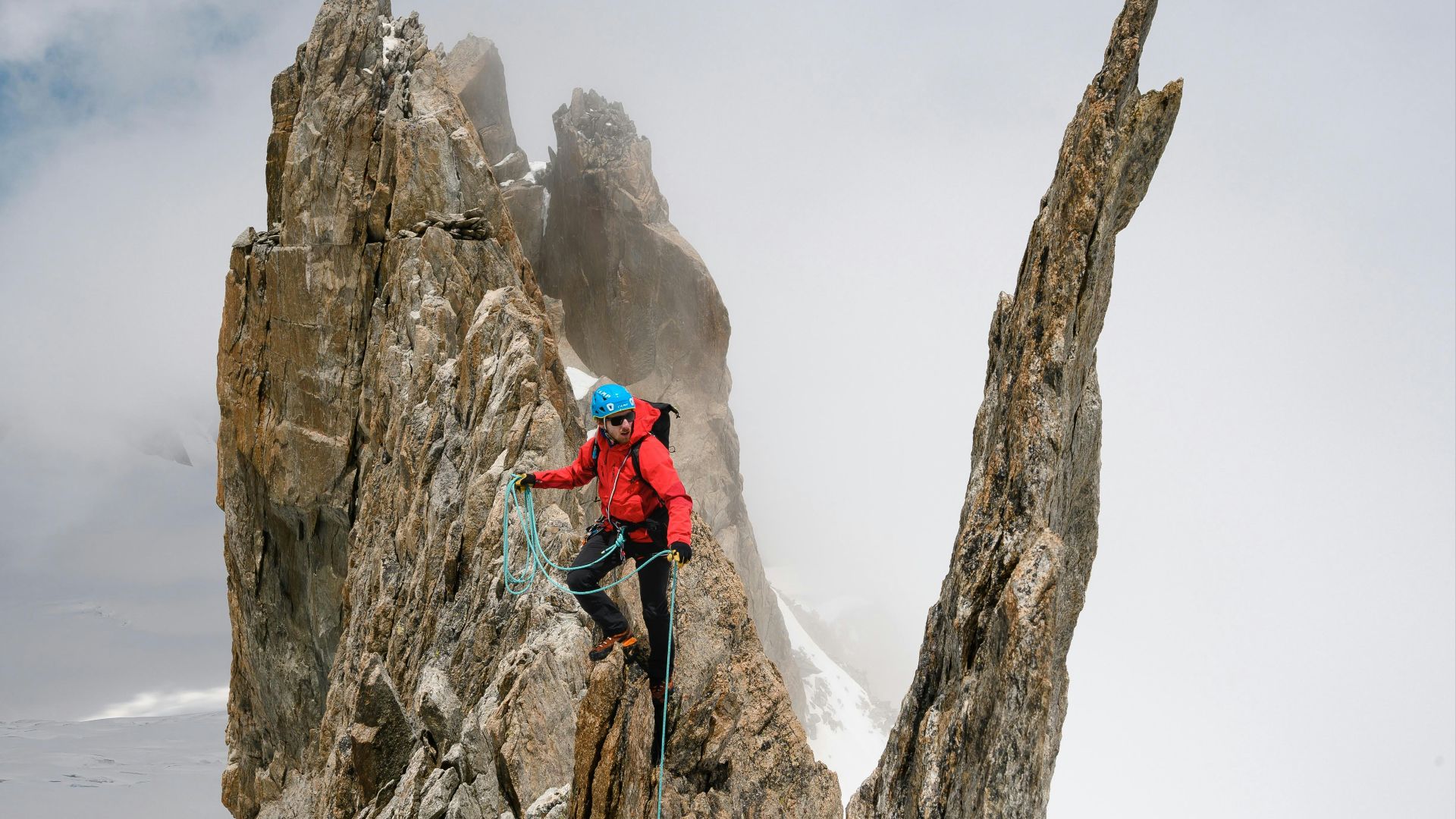 a person climbing a rock