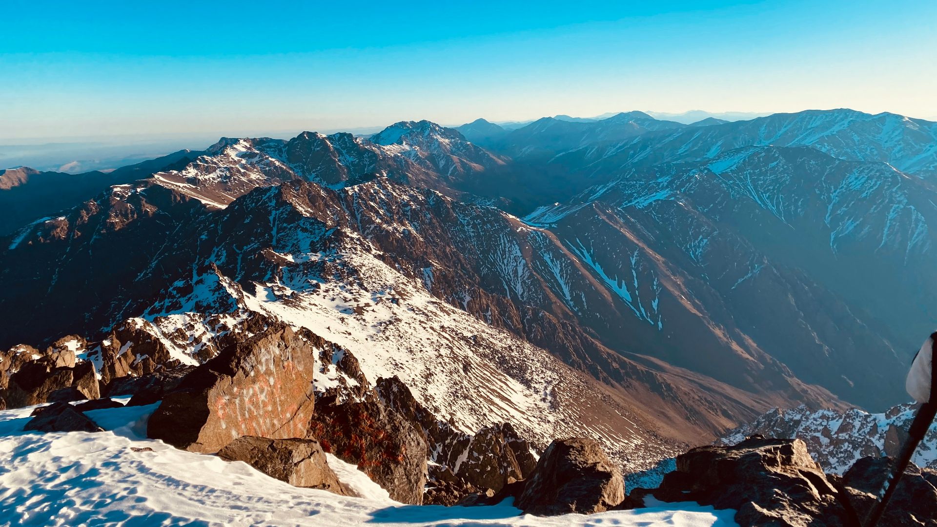 snow covered mountain under blue sky during daytime