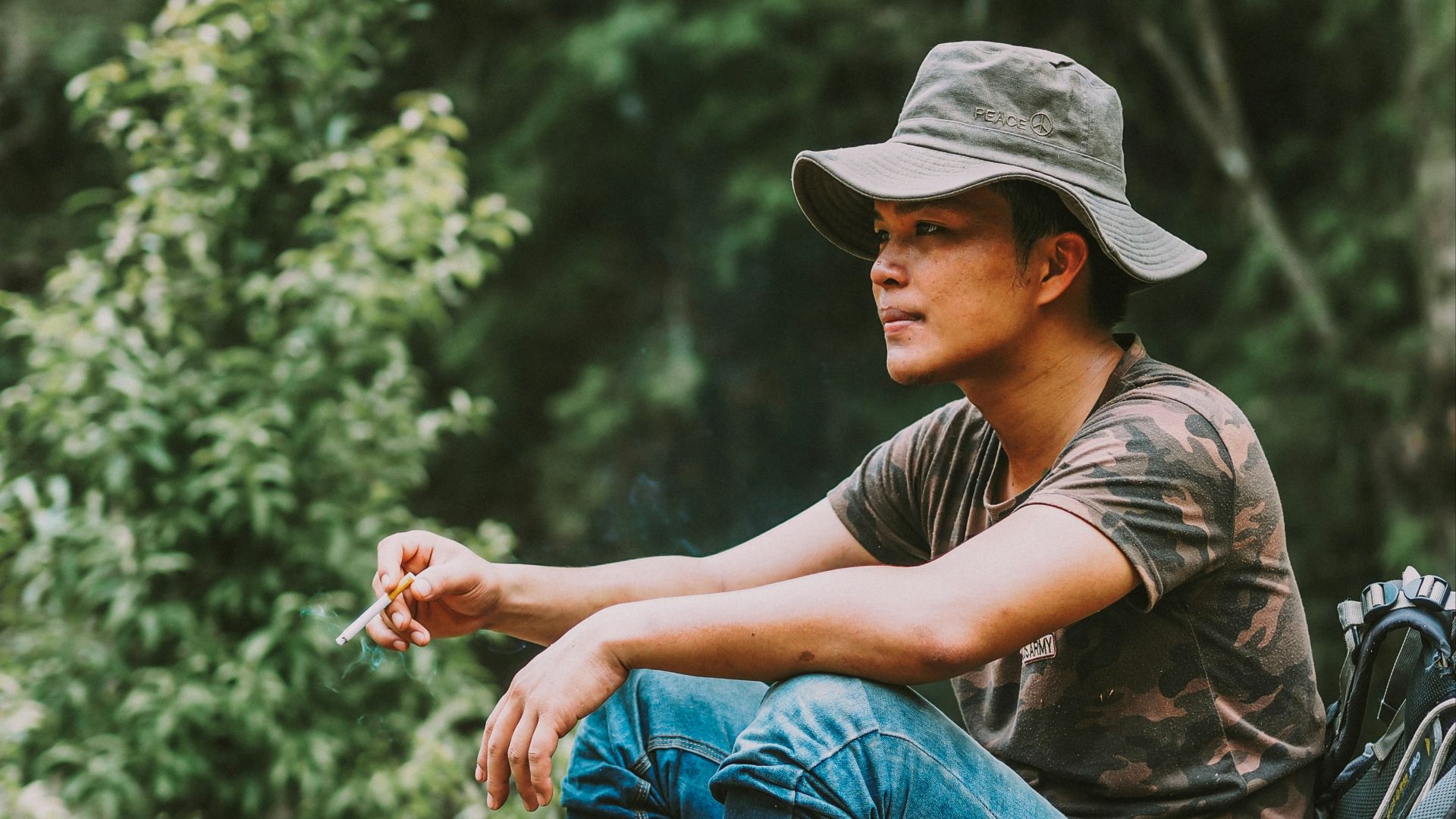 man wearing woodland camouflage top