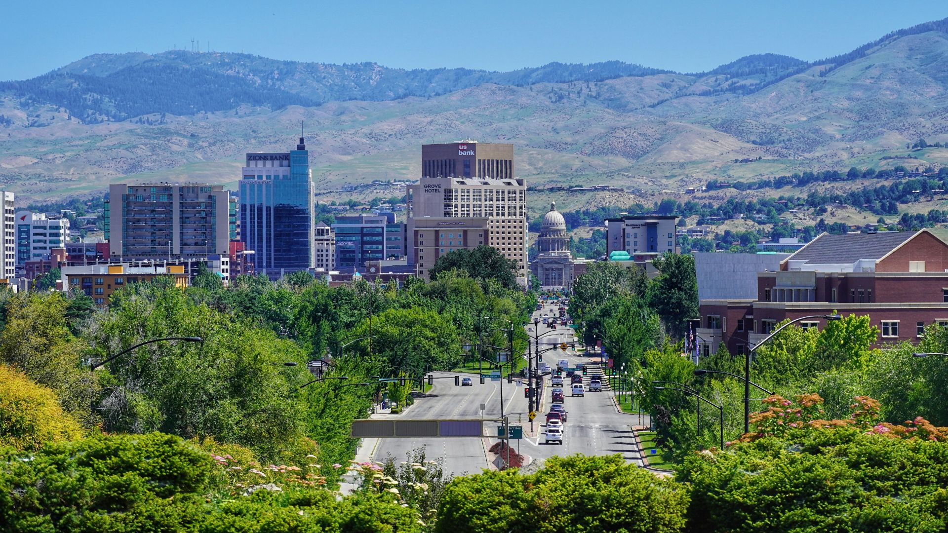 city skyline under blue sky during daytime