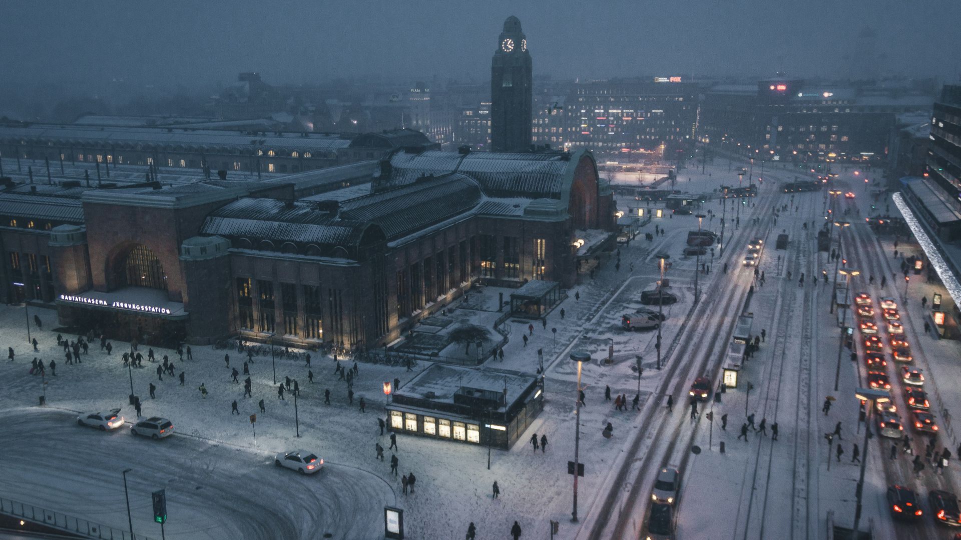 aerial photography of street at night covered with snow