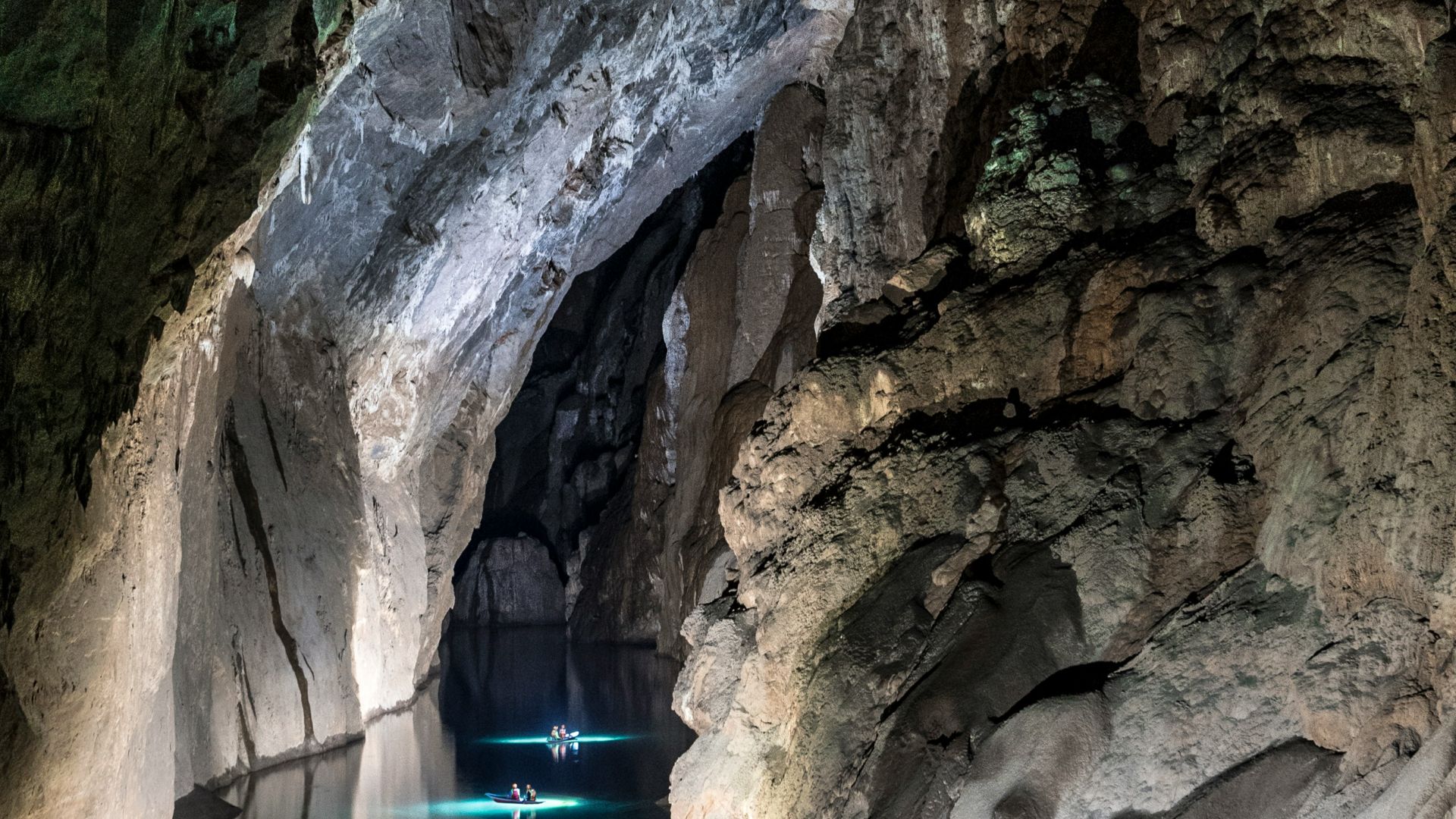 a person sitting on a rock