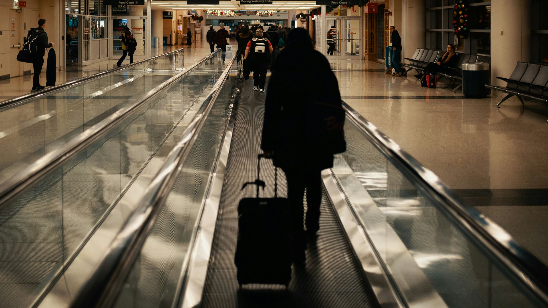 walking man holding luggage