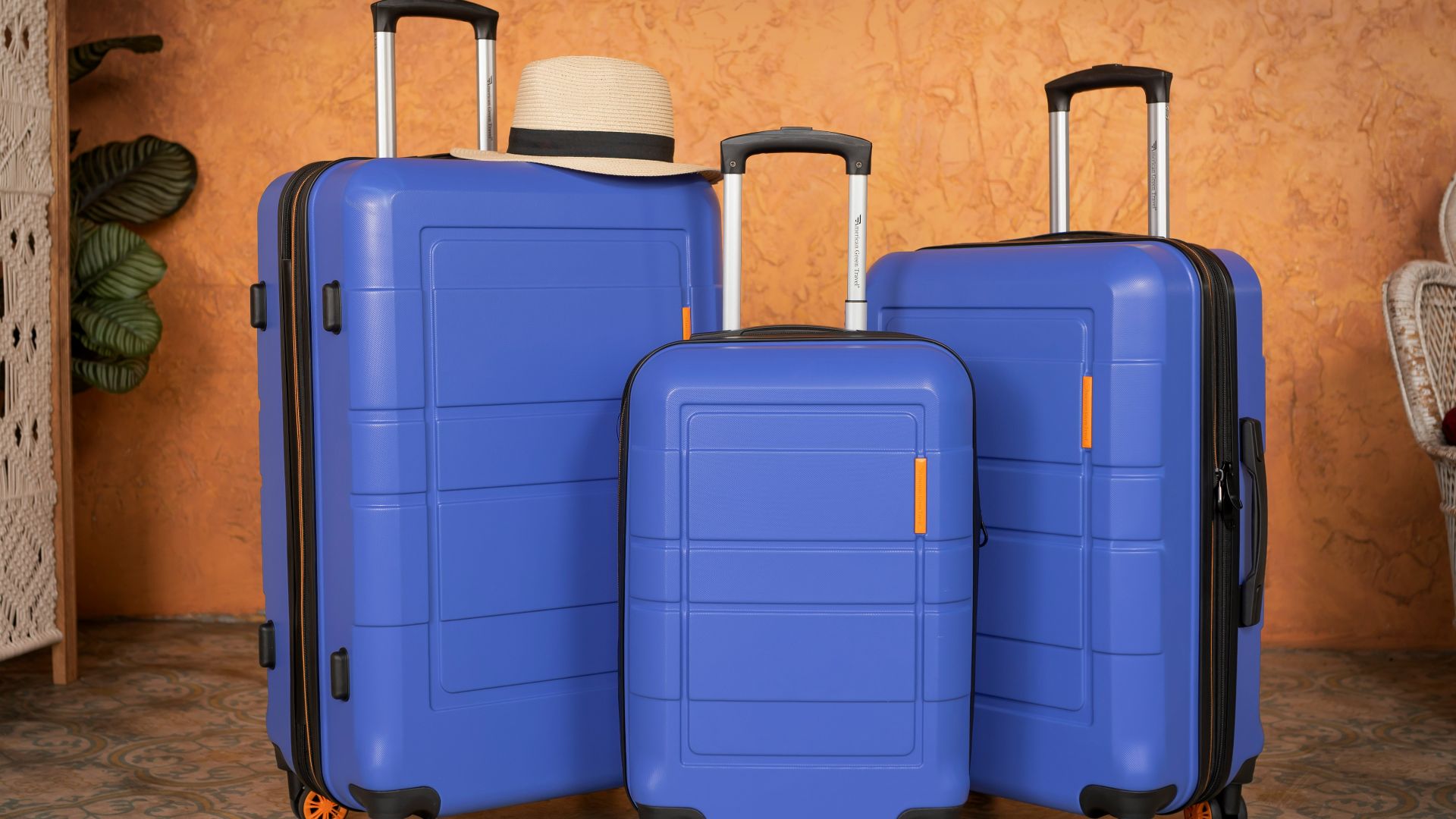 three pieces of blue luggage sitting next to each other