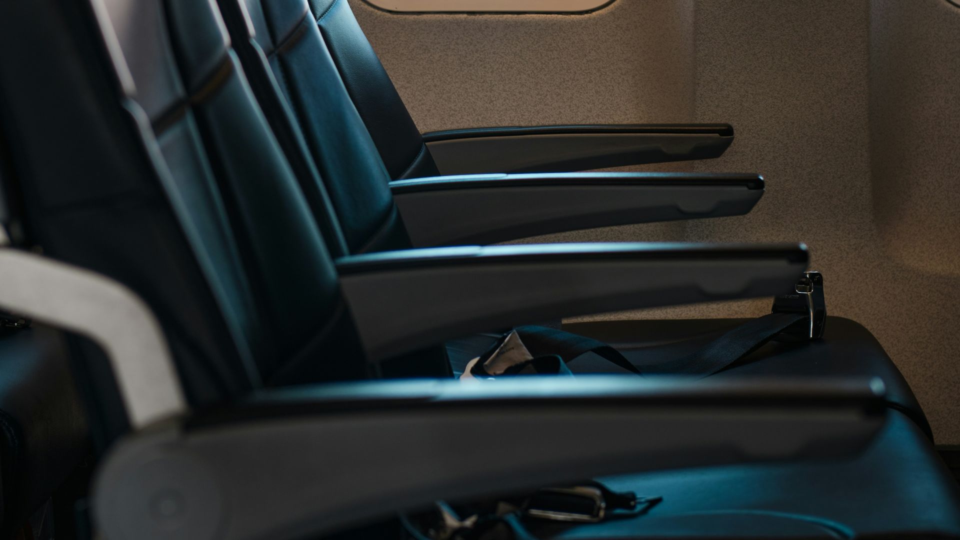 a row of empty seats in an airplane
