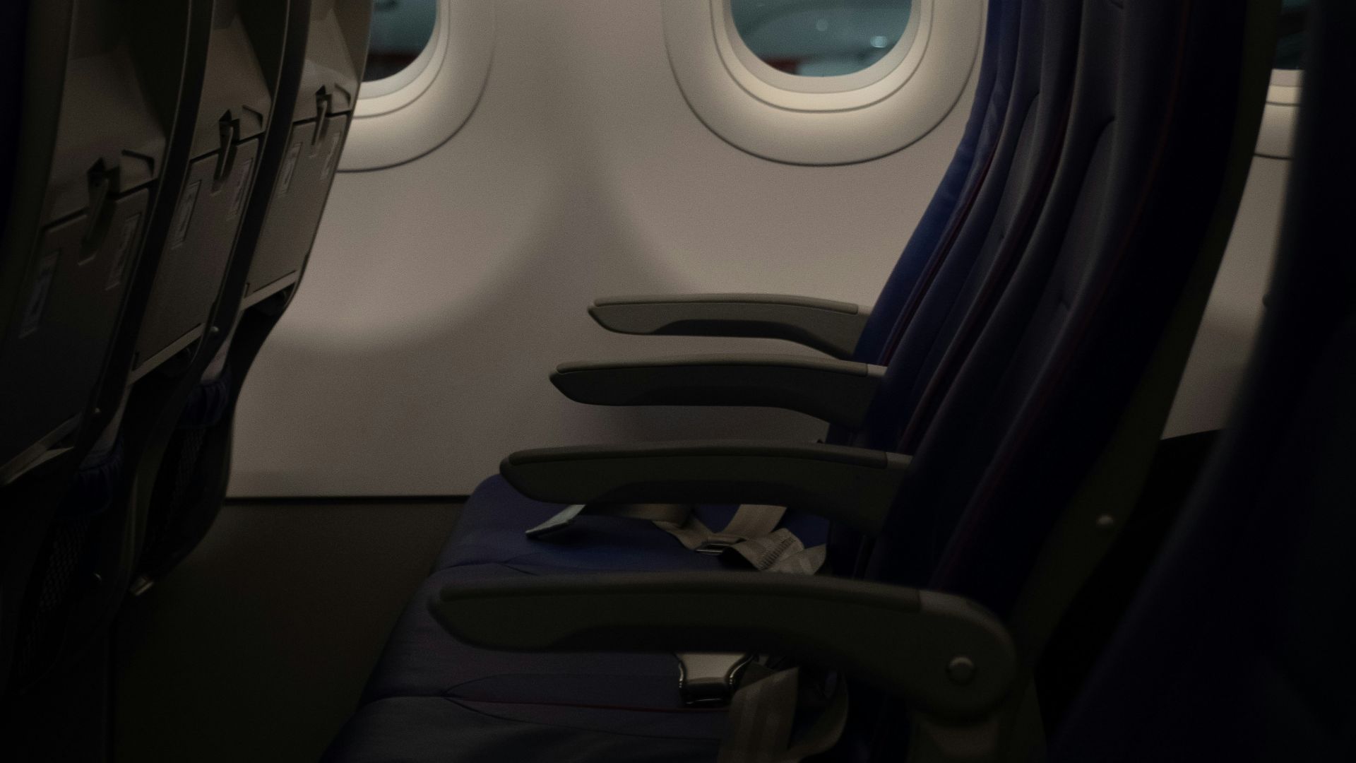 A row of empty seats in an airplane