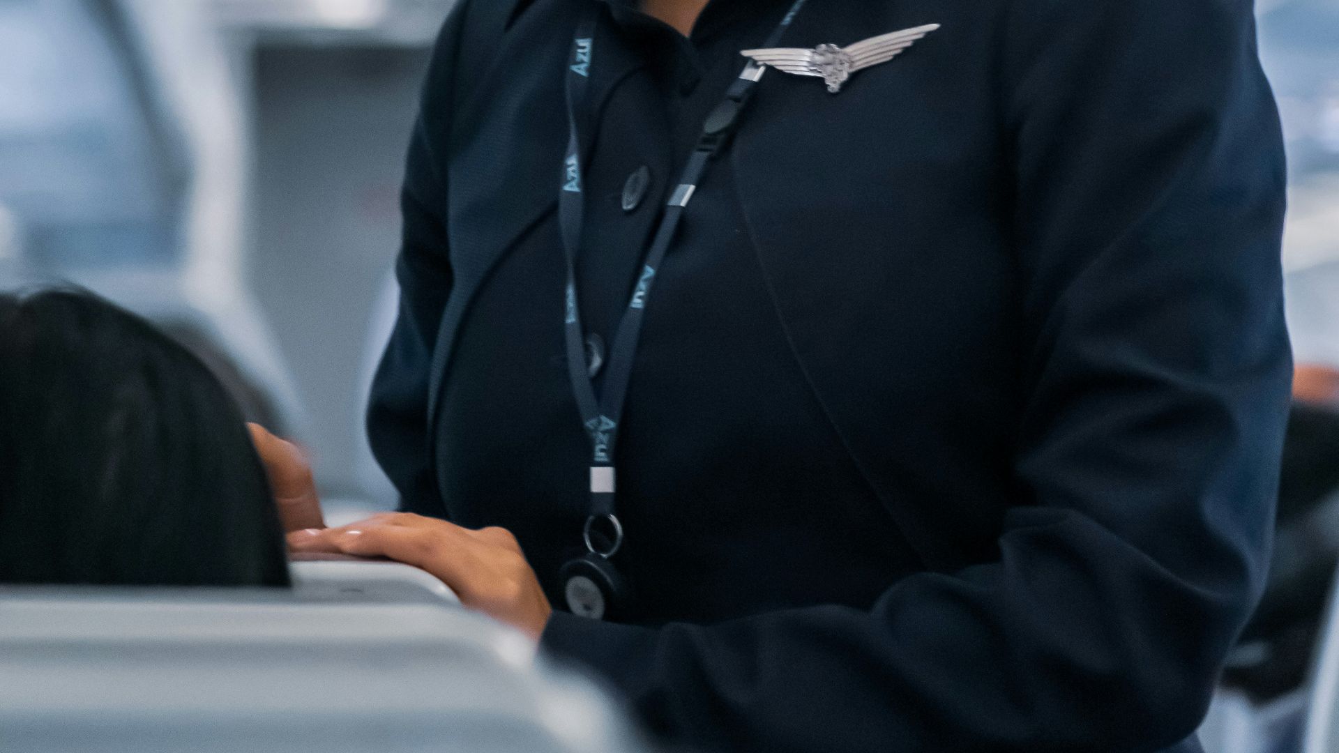 man in black suit jacket wearing mask