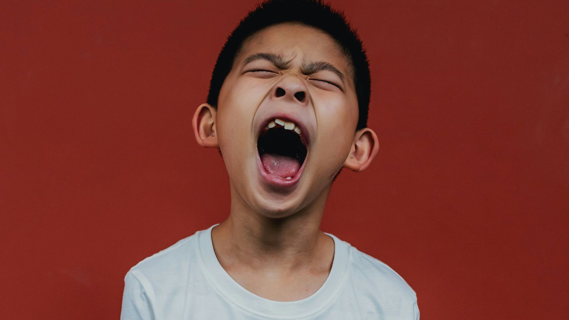 boy in white crew neck t-shirt