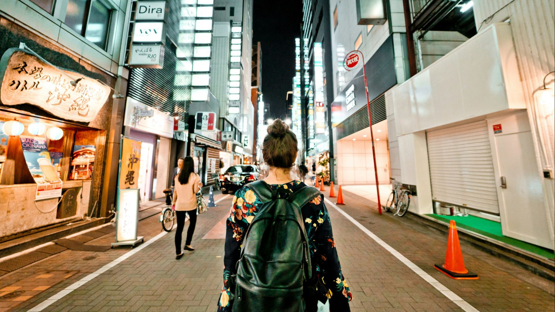 photo of person carrying black bag