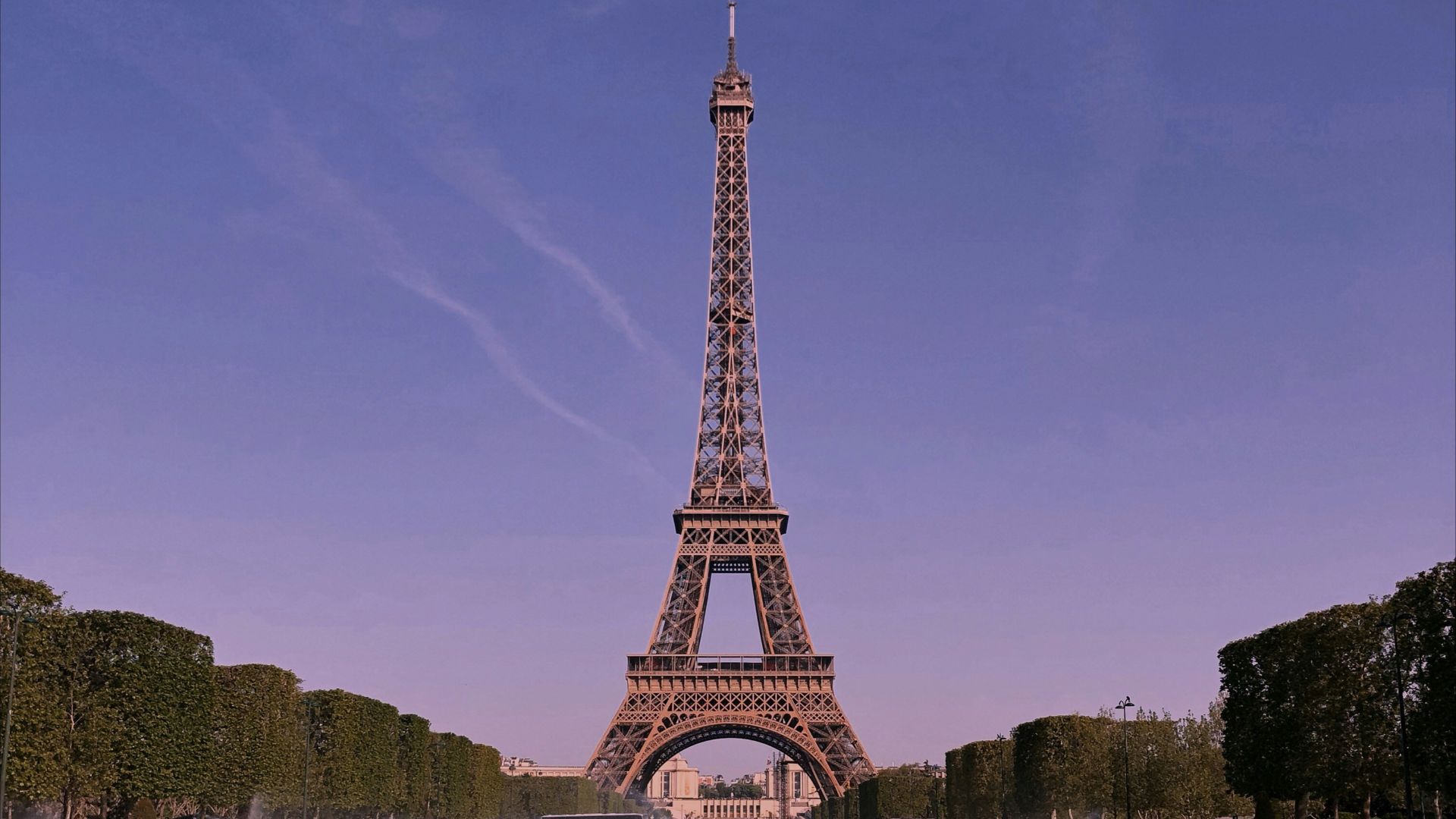 the eiffel tower is reflected in the water