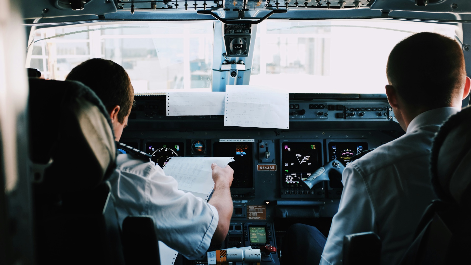 two men inside the plane