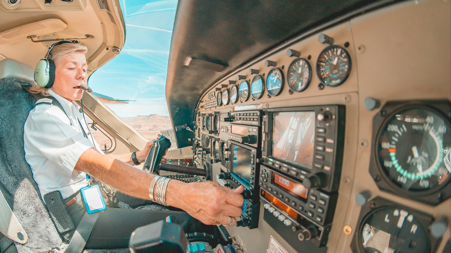 person in black jacket driving car during daytime