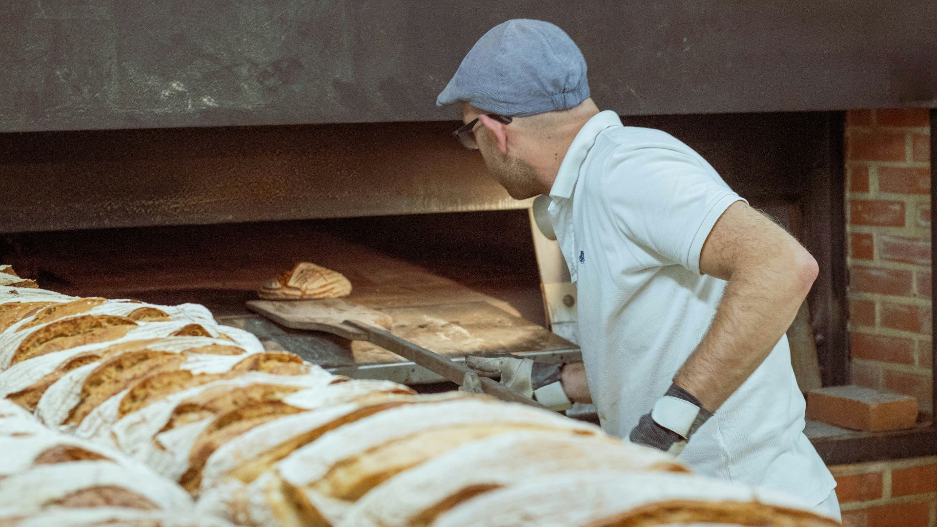 man wearing white polo shirt